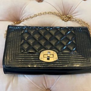 Black quilted clutch